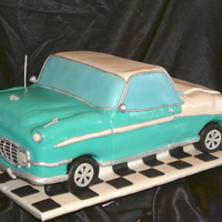 1956 Bel Air This was done out of 3 1/2sheets of cake. Covered with MMF. I also used rice krispy treats for the wheels covered in MMF.