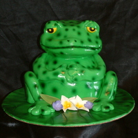 Frog On A Lily Pad This cake was made from two 8 inch round cakes and one 6 inch round cake for the body and the head was out of two 6 inch round cakes....