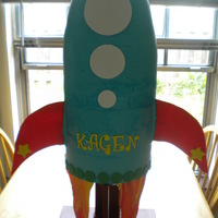 Fly Me To The Moon!!! My son's 3rd birthday cake! He loves rockets and space and picked out a rocket cake!the cake is 20 inches on a custom built steel &...