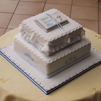 Baby Boy's Christening Cake This cake was for a baby boy Christening. Cake sizes 6'' and 8'', all covered in marzipan and sugarpaste. The mother...