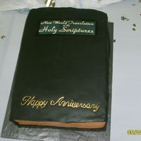 Bible Dark chocolate cake w/buttercream filling. Covered in fondant. THANKS to Godiva for the inspiration!!