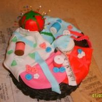 Sewing Cake French Vanilla cake with chocolate buttercream. All accents are fondant