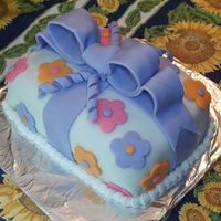 First Fondant Covered Cake This was my first fondant covered cake done in Wilton III class.