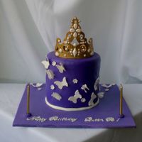Royalty I made this cake for a clients birthday. She wanted a crown and choose the colors of royalty. The crown is made out of fondant with fondant...