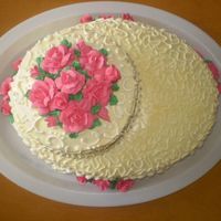 50Th Birthday made for a family friend's 50th birthday. Buttercream icing with RI flowers.