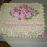 Birthday Cake buttercream frosting with royal icing flowers