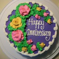 Anniversary WASC Cake with raspberry filling, buttercream frosting