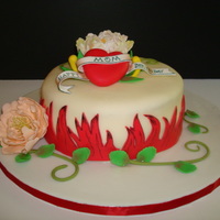 Tattoo Art Heart Red velvet cake, cream cheese buttercream filling. Fondant covered and decorated, with gumpaste peonies.