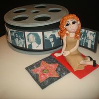 Hollywood Birthday Red velvet cake, with cream cheese buttercream, covered with fondant. All decorations are gumpaste. This was my first attempt at a Lorraine...