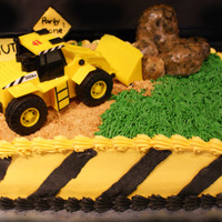 Constuction Cake All butter cream with fondant covered rocks(rice krispy treats) and graham cracker road