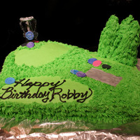 Disc Golf Birthday Cake this cake was covered in buttercream, buttercream trees, fondant discs and pad. With a wire net