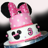 Minnie Mouse Birthday Cake This was my version of a cake my friend gave me a picture of. All cake is covered in buttercream, with fondant accents and gumpaste ears (...