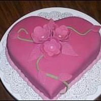 Valentine's Day Cake Fondant covered. Fondant cut out flowers.