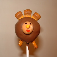 Turkey Cake Pops Gobble Gobble.... these are yellow sponge cake inside dipped in melted chocolate. Feathers are carame candy corn, faces are halved caramel...