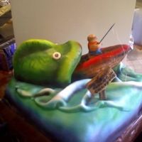 Bass Gets Back This was a chocolate cake made with home made fondant. It was sprayed with an airbrush to give it the effects of shading and the cartoon...