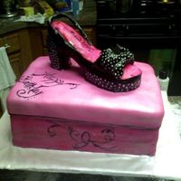 Shoe And Shoe Box A Vanilla Almond Cake with a Shoe made of Rice Krispies Covered with homemade fondant. This cake was hand painted and the pink was sprayed...