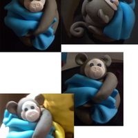 Fondant Baby Monkey Lil baby monkey was made with fondant/gumpaste mix for a baby shower cake.