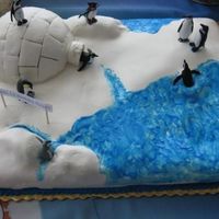 Happy Feet Birthday Cake This was my very first fondant covered cake from May 2008. I've come a long way since then. I'm glad I didn't give up on the...