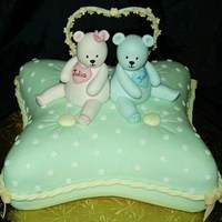 Twins Baby Shower Cake I made this cake for a lady who was having twins, a boy and a girl. For the pillow I used one of the Wilton's pillow cake pans, but I...