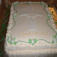 First Communion The cross is fondant from the Wilton yearbook. The roses were my firstattempt at fondant. I need to practice my writing though. Thanks for...