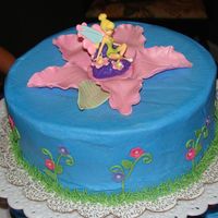Tinkerbell Cake Iced in buttercream with gumpaste flowers