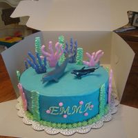 Under The Sea Buttercream with royal icing decorations and toy whale and dolphin. Inspired by BellesMom.