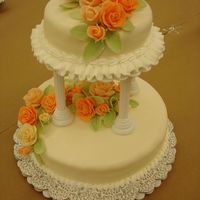 Peach Rose Cake For Class! Cake I made for my Wilton class. First time ever trying to make fondant roses, and first time using this method for stacking!