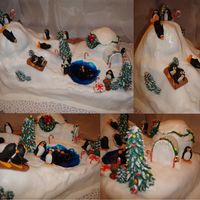 Penguins I decided to make my own Birthday cake this year, so Happy Birthday to me!! This is also my first carved cake. Carved then covered in...