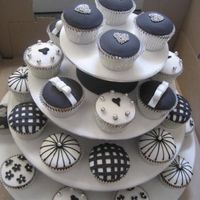 B&w Weding Cupcakes Black and white cupcakes I did for a friends wedding. Made the stand as well and covered with icing
