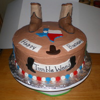 Cowboy Boots Cowboy Boots -marshmallow treat covered in fondant. Buttercream frosting and fondant decorations.