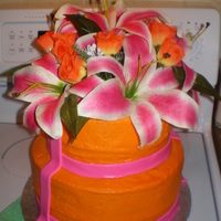 Tropical Wedding Buttercream frosting, fondant ribbon, silk flowers