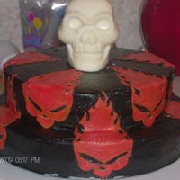 Skull And Flames The cake is chocolate with dolce de leche filling. My husband loves skulls, flames, and what not. So I came up with this. Burning skull...
