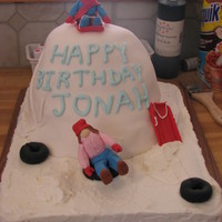 Sledding Cake Made for my son's sledding birthday party. Carved mountain covered in fondant with some airbrushing, on a sheetcake. Sledders and...