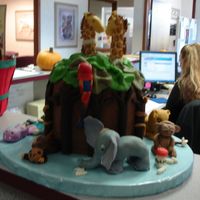Rain Forest / Jungle This is the second cake I made for the Childrens Hospital bake sale at my office. I found a similar picture in a cake book but the animals...