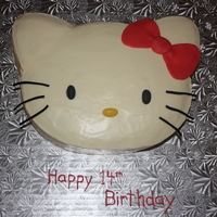 Hello Kitty This is a vanilla cake with whipped strawberry filling. It is covered in vanilla icing, not fondant as the woman I made it for doesn't...