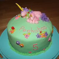 Field Of Unicorns!! For my daughter's 5th birthday cake, she requested a field of unicorns (with a Mommy and a baby). The cake is rainbow swirl, with...