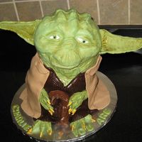 Yoda Yoda, made from RKT for head, stacked cakes for body, fondant for body gumpaste for ears