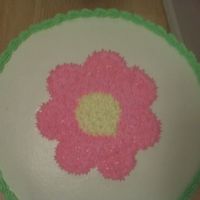 Img00493.jpg French Vanilla WASC w/chocolate mousse filling and vanilla buttercream. That's suppose to be a daisy. Sorry for the horrible cell...