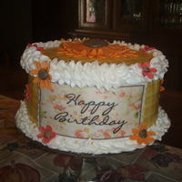 Fall Colors Birthday Cake Another cake for a different friends mom. It was near Thanksgiving so we did fall colors and an edible image wrap.