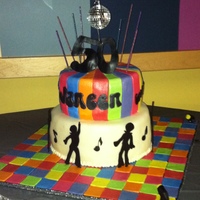 Disco Birthday Cake I did this for a dear friend's 50th disco birthday party. Made the cake to match the decorations. Covered in fondant with gumpaste...