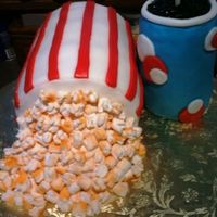 Ready For A Movie This cake is all edible except the straw!! "Popcorn Carton" is 3-6" round cakes, torted, dirty iced, and covered with...