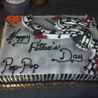 Just Music Iced in all butter cream. Lightly airbrushed to give a "gray" top and the "piano" key were piped using a #70 (basket...