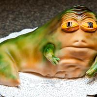 Jabba The Hutt Cake Jabba was covered in fondant and then sprayed with an airbrush.