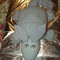 Armadillo White cake with vanilla buttercream and fondant. The picture is not super good, but that cake took quite a while!
