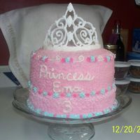 Princess Cake With Tiara this is a three layer cake with strawberry cake mix. buttercream icing. The tiara is RI.