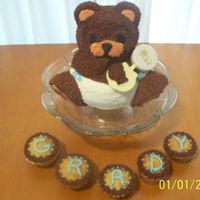 Baby Shower 3D Bear Cake I had so much fun doing this cake! it turned out really cute! it's chocoloate butter cream frosting mainly. I stuck a rattle under his...