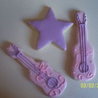 Guitar And Star Cookies For Hannah Montana Birthday Sugar cookies with RI