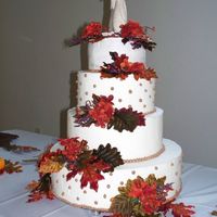 Fall Wedding Cake This was my first wedding cake. I had a hard time with the top tier. I frosted it over 4 times!!!! The bottom three tiers are styrofoam. I...