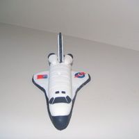 Space Shuttle Space shuttle made from fondant and gum paste for my 2 year olds birthday cake.