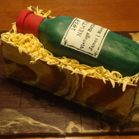 Wine In Crate This was for my parents 50th wedding anniversary. A really fun cake to make. The cakes are chocolate rum cakes. Covered with Fondant. The...